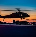 Black Hawks taking off into the sunset