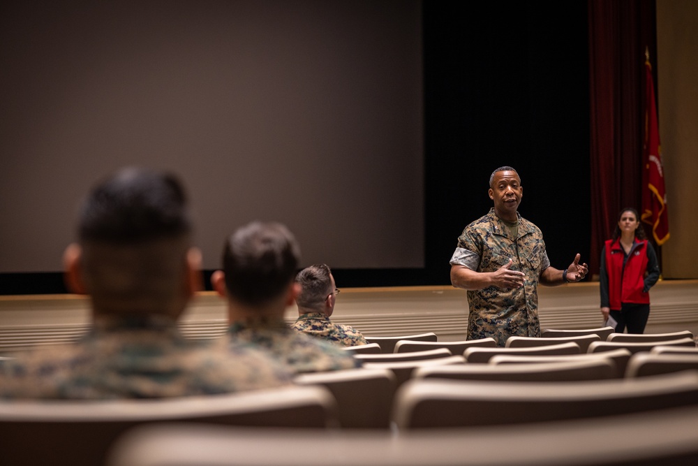 Col. Michael L. Brooks speaks to Navy-Marine Corps Relief Society representatives