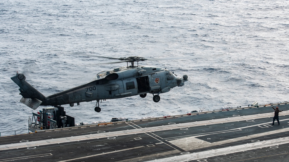 Helicopter Takes Off From Flight Deck