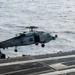 Helicopter Takes Off From Flight Deck