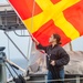 Sailor Stows Signal Flag