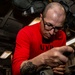 Sailor Disassembles Bomb Rack