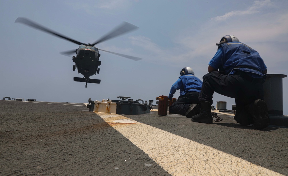 USS Milius (DDG 69) Conducts Flight Quarters with Army Black Hawk Helicopter