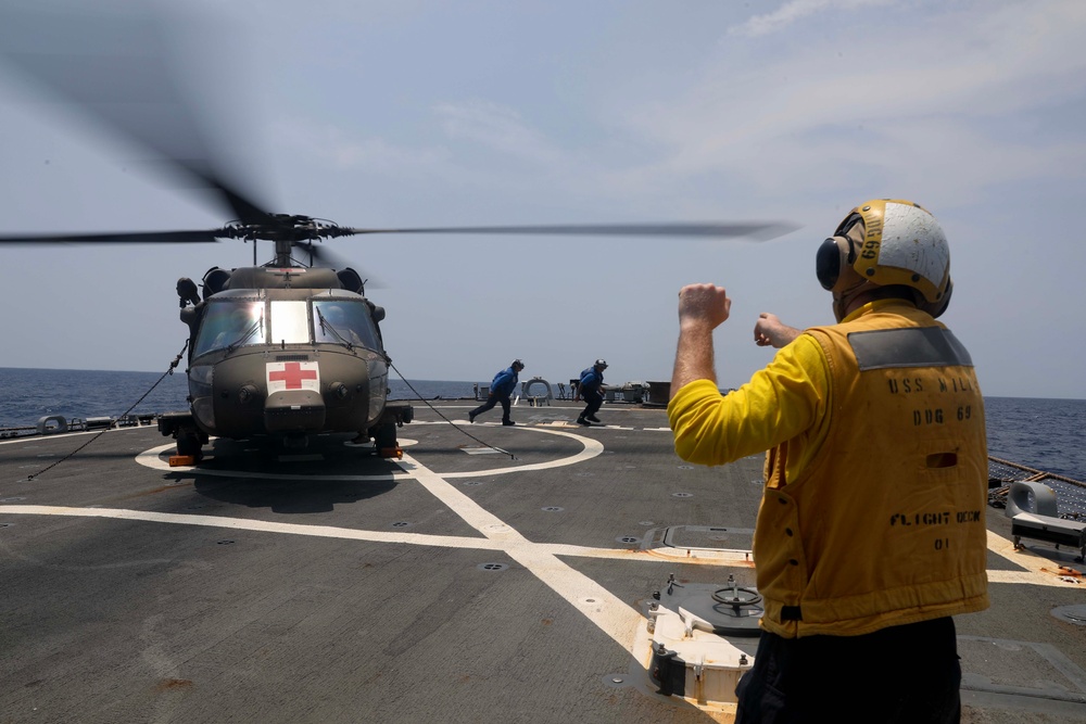 USS Milius (DDG 69) Conducts Flight Quarters with Army Black Hawk Helicopter