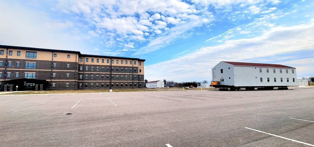 Contractors move third World War II-era barracks to new location