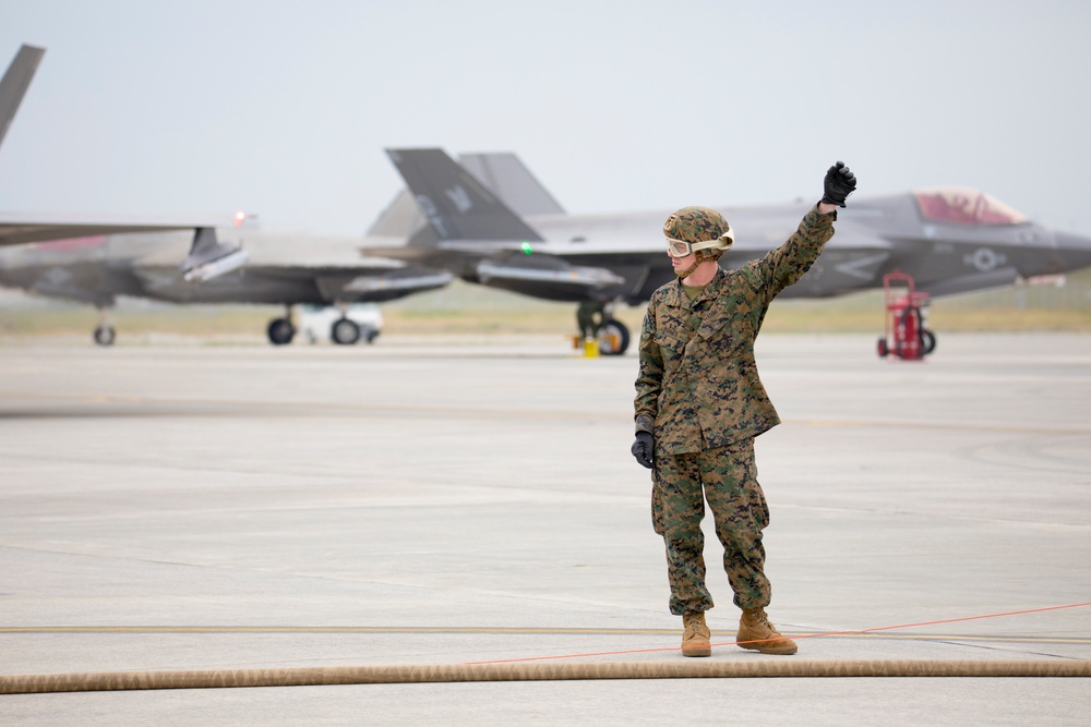 Marines with MAG-12 refuel armed F-35s