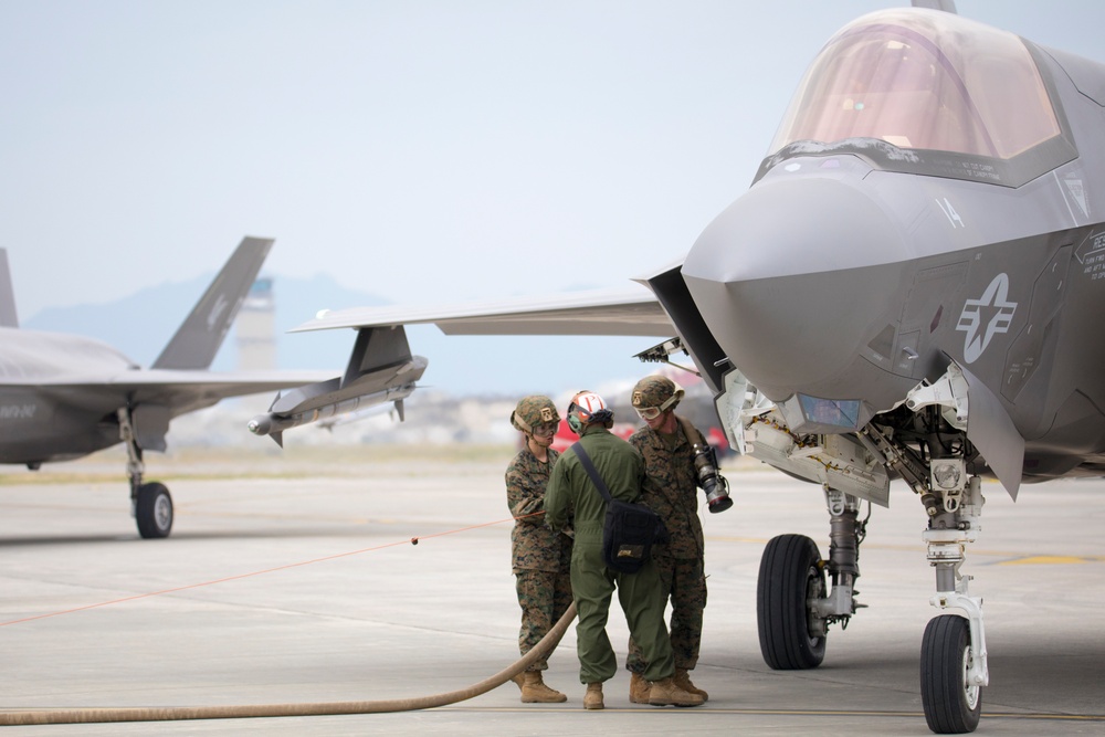 Marines with MAG-12 refuel armed F-35s