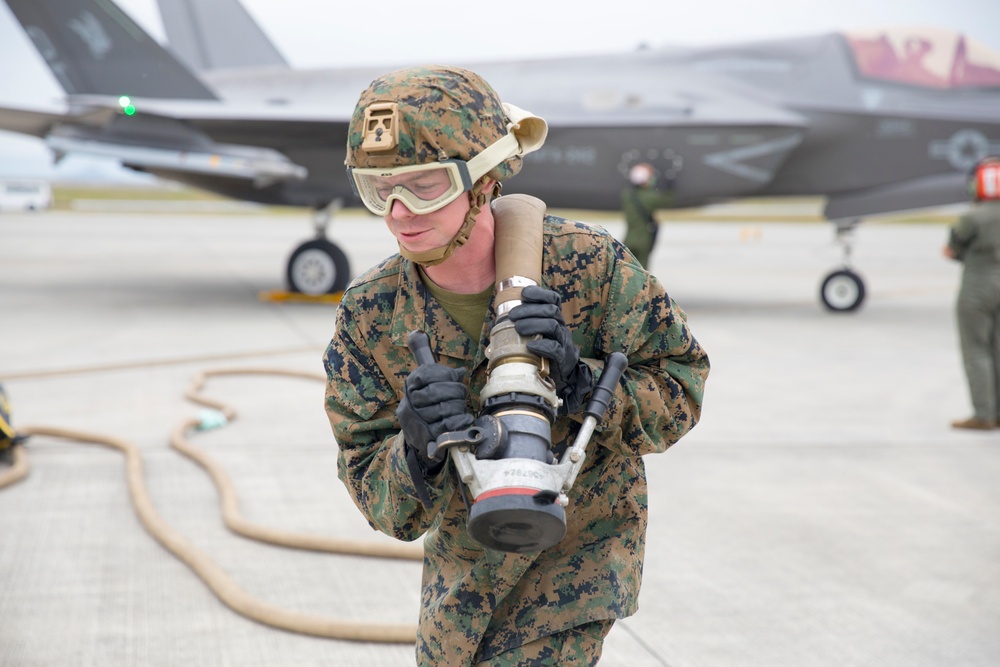 Marines with MAG-12 refuel armed F-35s
