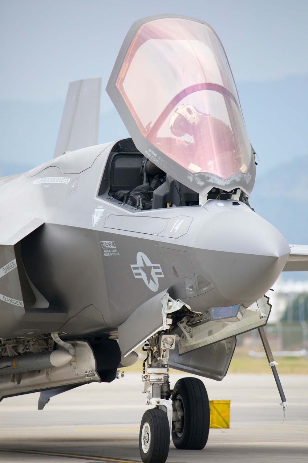 Marines with MAG-12 refuel armed F-35s