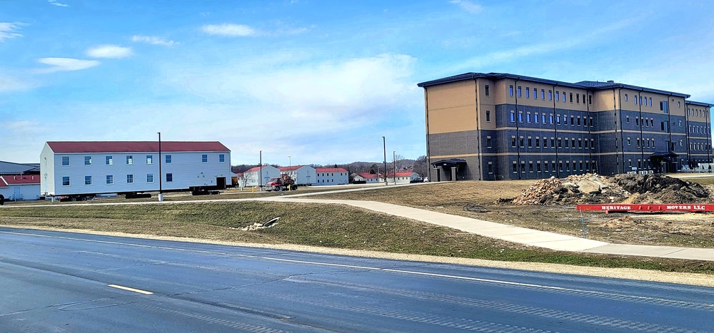 Contractors move third World War II-era barracks to new location