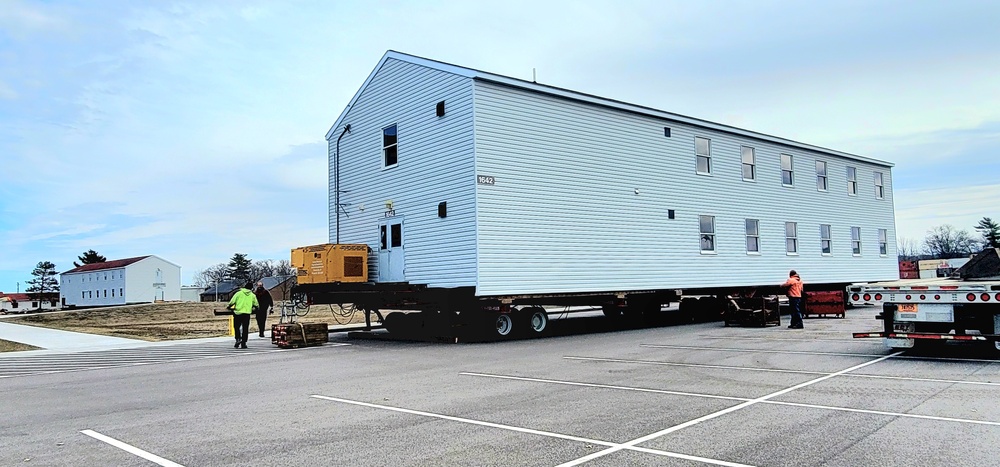 Contractors move third World War II-era barracks to new location