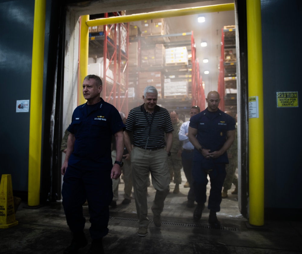 The Assistance Secretary of Defense tours a chilled warehouse on Guam