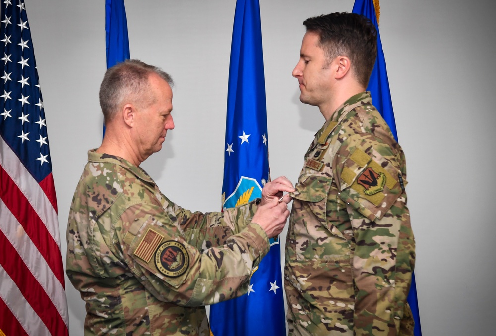 COMACC presents Distinguished Flying Cross to 363 ISRW Airman for extraordinary efforts