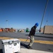 USS Tripoli Sailors Offloads Ammo Containers