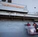 USS Tripoli Sailors Paint Hull