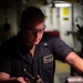 USS Tripoli Sailor Machines Parts During SRA