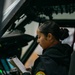 Sailor preforms systems check on a helicopter aboard USS Carl Vinson (CVN70)