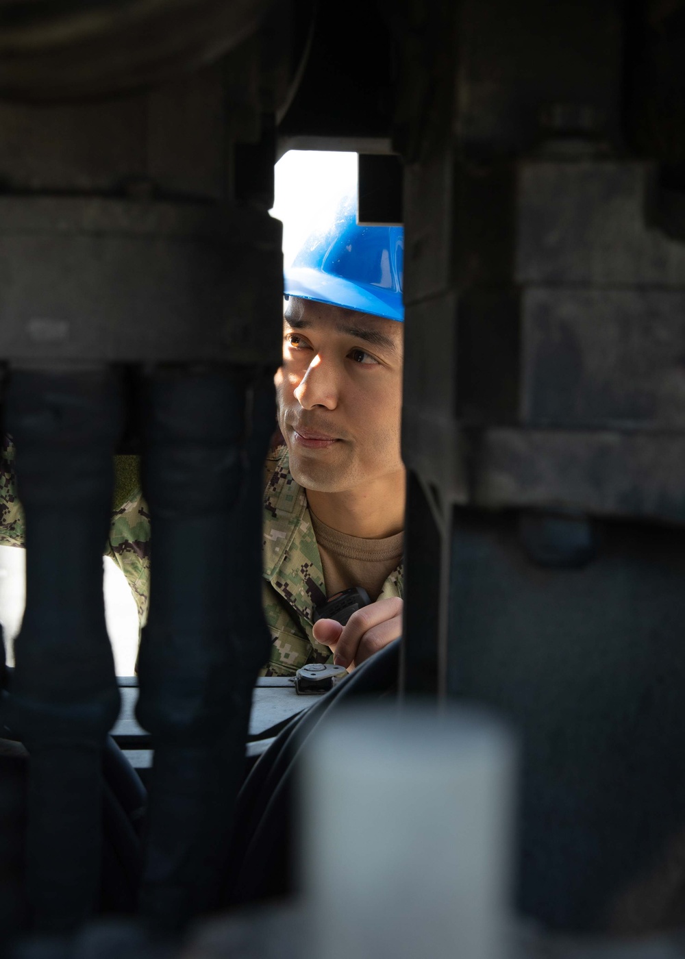 USS Tripoli Sailor Inspects Radar