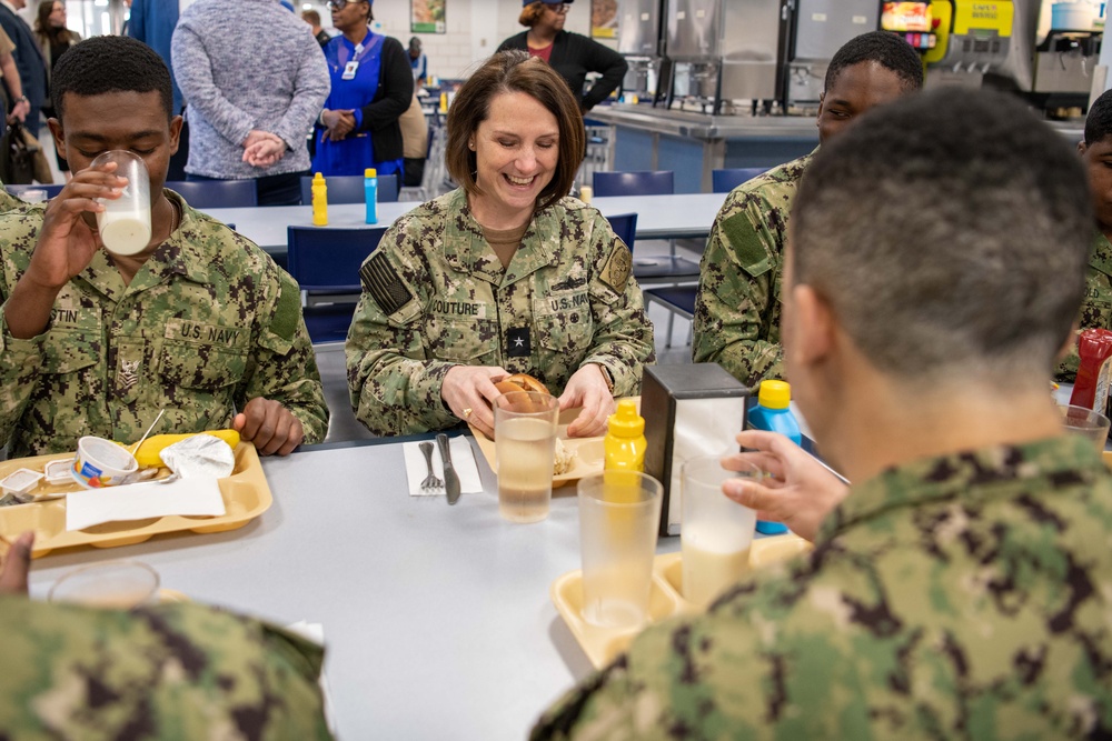 Rear Admiral Jennifer Couture eats lunch with recruits at Recruit Training Command