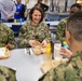 Rear Admiral Jennifer Couture eats lunch with recruits at Recruit Training Command