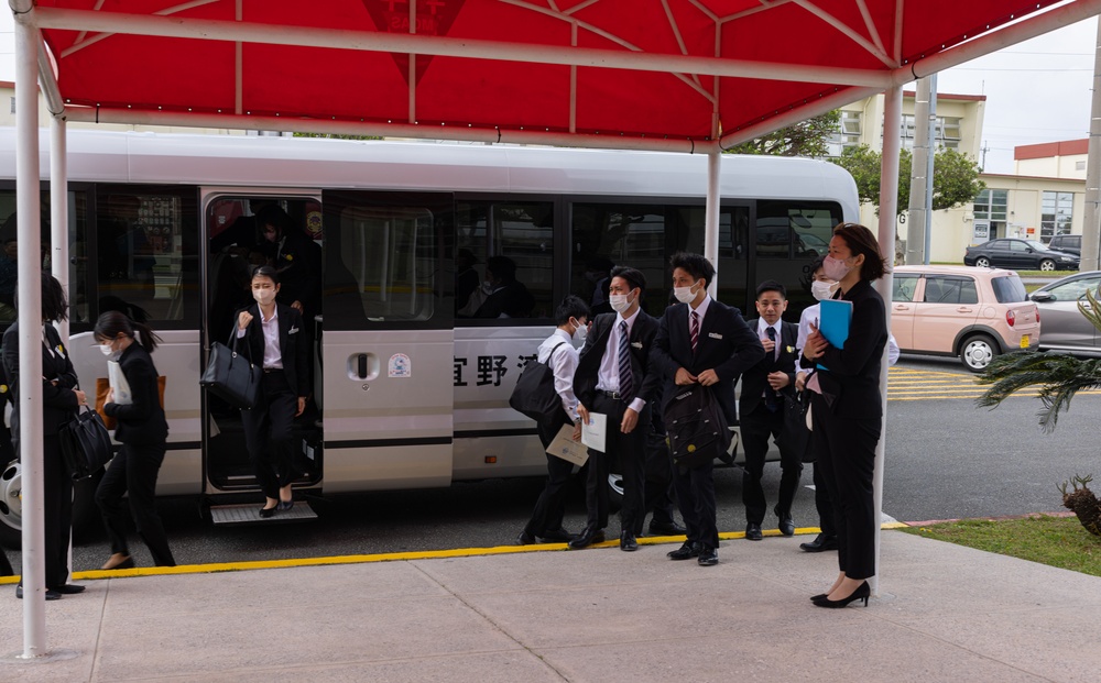 Commanding Officer of MCAS Futenma give tour to Ginowan City employees
