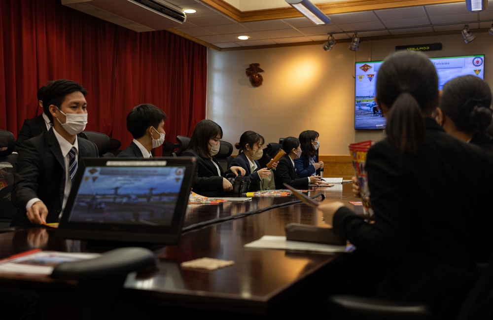 Commanding Officer of MCAS Futenma give tour to Ginowan City employees