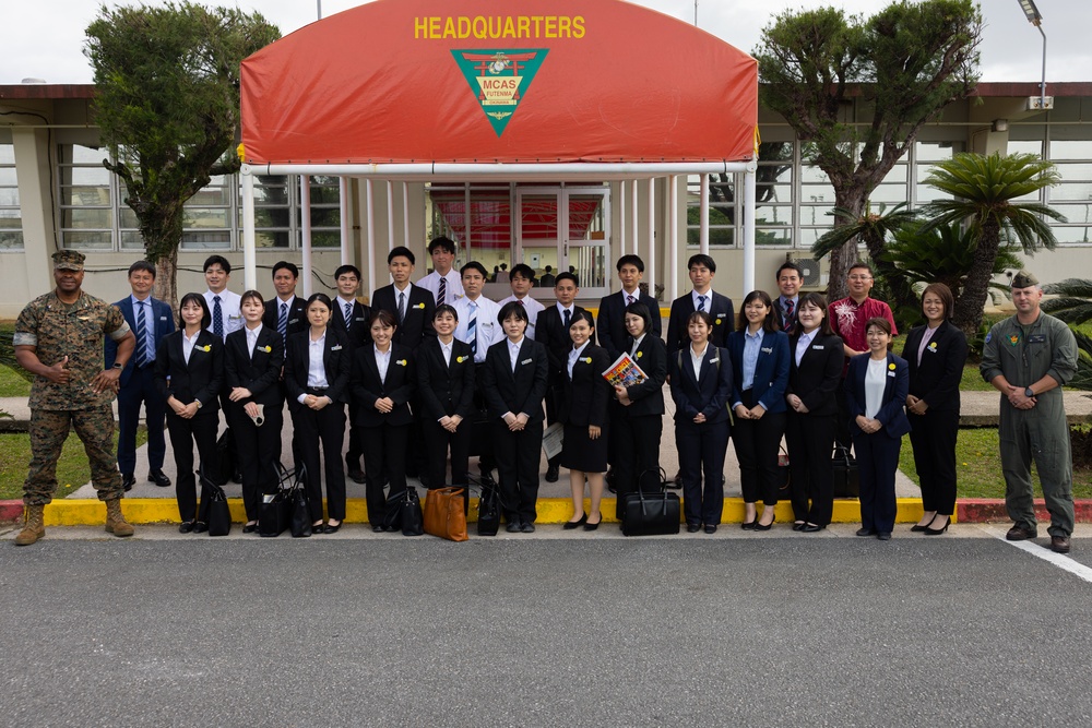 Commanding Officer of MCAS Futenma give tour to Ginowan City employees