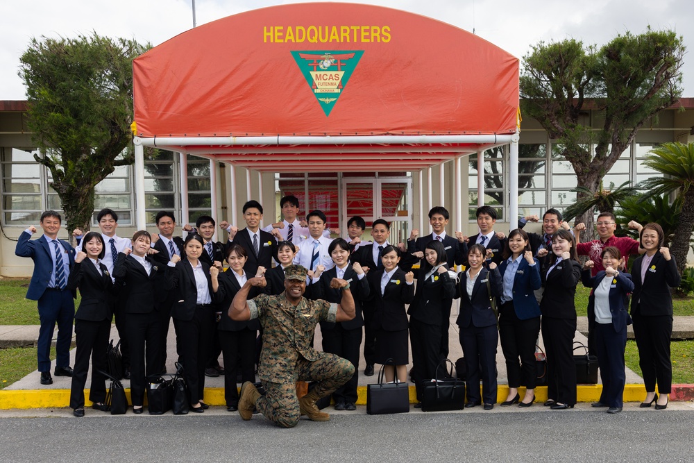 Commanding Officer of MCAS Futenma give tour to Ginowan City employees