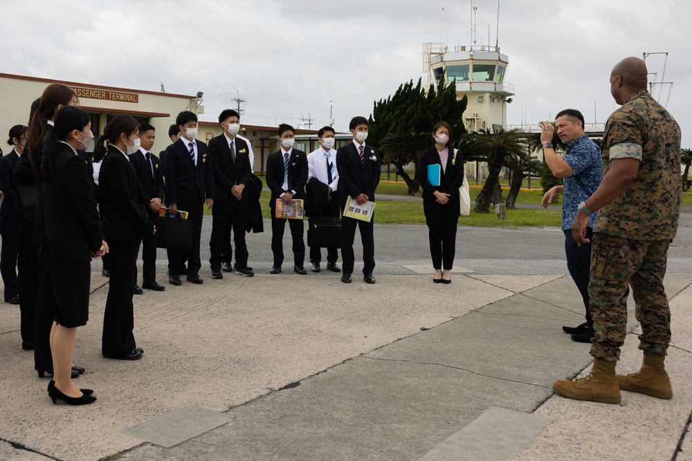Commanding Officer of MCAS Futenma give tour to Ginowan City employees