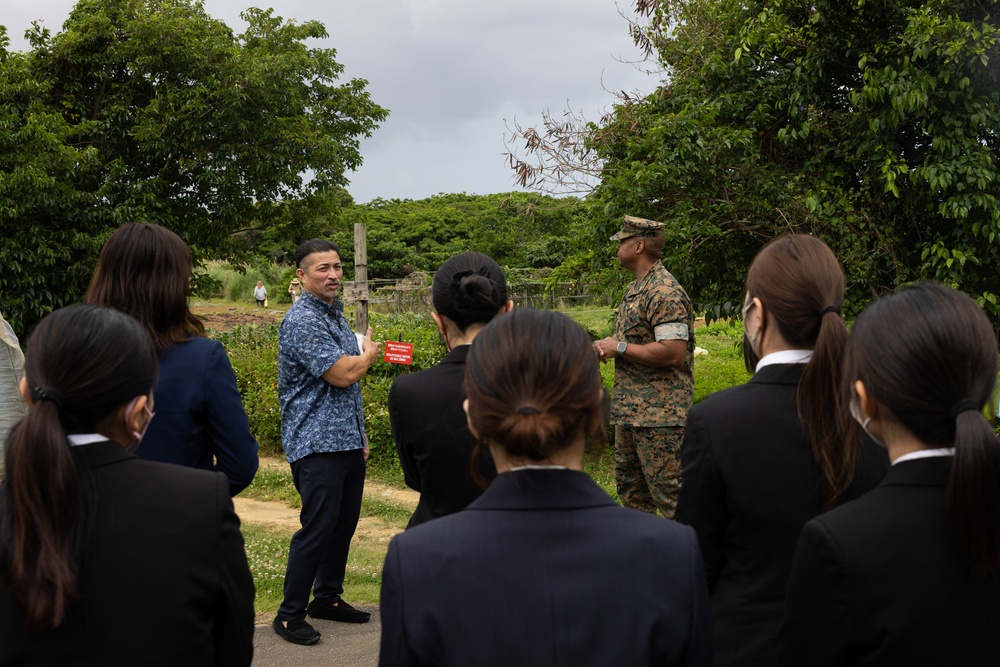 Commanding Officer of MCAS Futenma give tour to Ginowan City employees