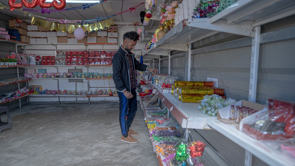 Meet Khaled, 27, a displaced Yezidi man, who received support from USAID to open his gift shop at Khanki Camp in Duhok Province.