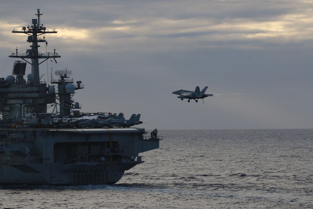 An F/A-18E Super Hornet Prepares to Land on The Flight Deck of USS Carl Vinson (CVN 70)