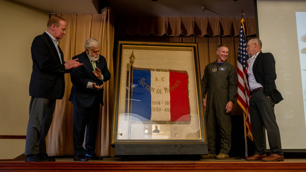 Luke Unveils Murvaux flag at Club Five Six