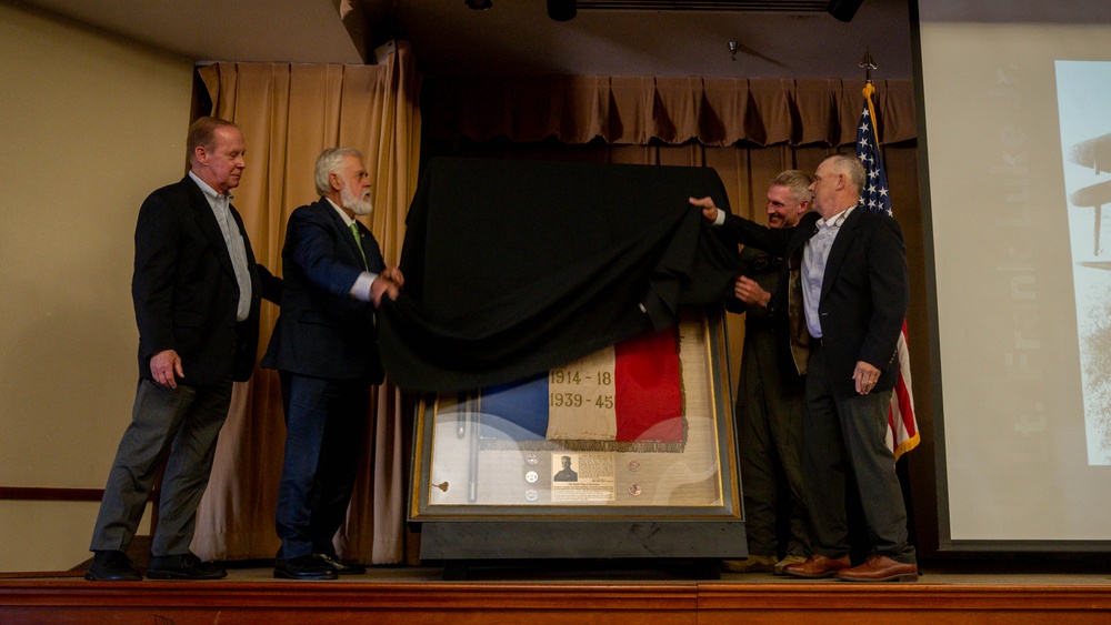 Luke Unveils Murvaux flag at Club Five Six