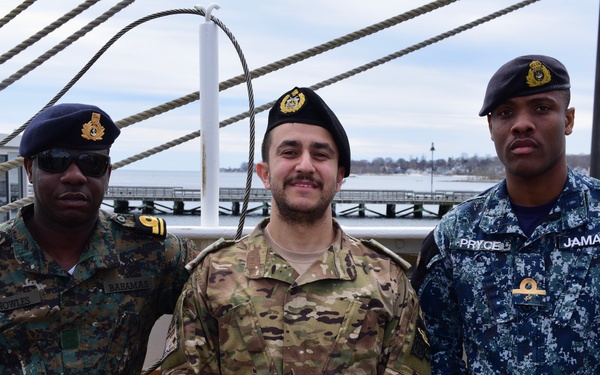 Foreign military partner members prepare to get underway aboard the USCGC Eagle