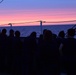 Coast Guard personnel aboard USCGC Eagle enjoy twilight while underway in the Atlantic Ocean