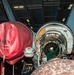 Sailor Inspects Engine Cavity Interior