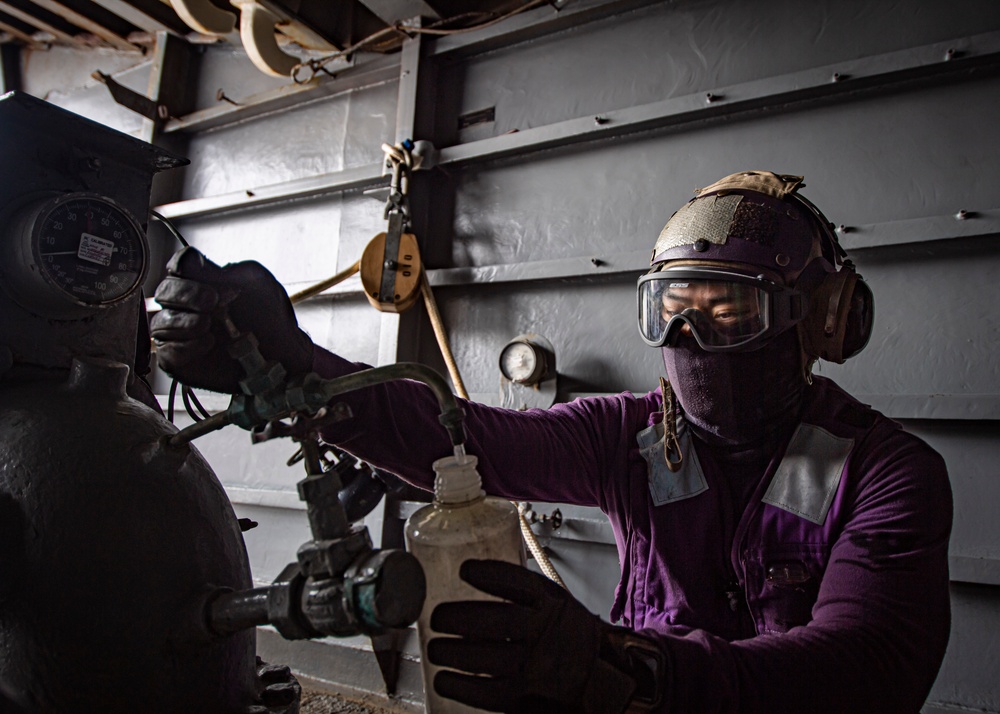 Sailors Take Fuel Samples