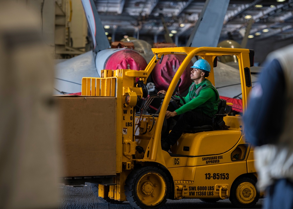 Sailor Drives Forklift