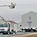 Continuing making history: Contractors move last two World War II-era barracks to new locations