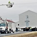 Continuing making history: Contractors move last two World War II-era barracks to new locations