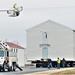 Continuing making history: Contractors move last two World War II-era barracks to new locations