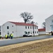 Continuing making history: Contractors move last two World War II-era barracks to new locations