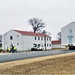 Continuing making history: Contractors move last two World War II-era barracks to new locations