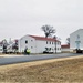 Continuing making history: Contractors move last two World War II-era barracks to new locations