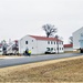 Continuing making history: Contractors move last two World War II-era barracks to new locations