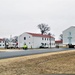 Continuing making history: Contractors move last two World War II-era barracks to new locations