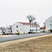 Continuing making history: Contractors move last two World War II-era barracks to new locations