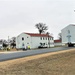 Continuing making history: Contractors move last two World War II-era barracks to new locations