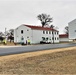 Continuing making history: Contractors move last two World War II-era barracks to new locations